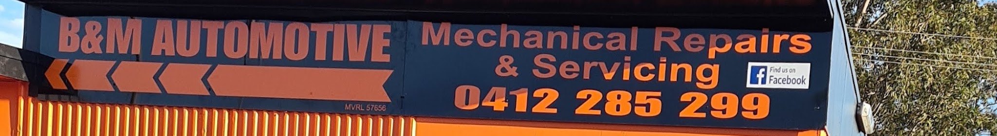 The B&M Automotive sign: Mechanical Repairs & Servicing, 0412 285 299, licence MVRL 57656